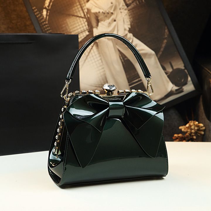 Túi nữ dáng vuông gắn nơ đính đá