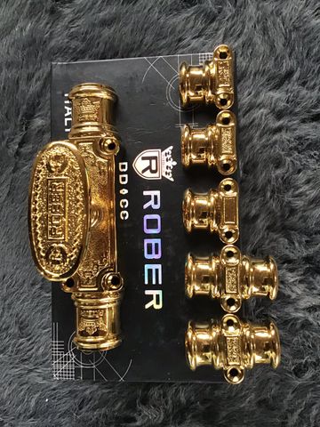 Chốt Kemon cửa đi Rober mạ vàng 24K