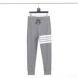  Quần jogger nam nữ form slim fit dáng Unisex Thom Browne 216 chất liệu nhung tăm mềm mại thiết kế kẻ sọc cực thời trang 