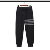  Quần jogger nam nữ form slim fit dáng Unisex Thom Browne 216 chất liệu nhung tăm mềm mại thiết kế kẻ sọc cực thời trang 