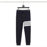  Quần jogger nam nữ form slim fit dáng Unisex Thom Browne 216 chất liệu nhung tăm mềm mại thiết kế kẻ sọc cực thời trang 
