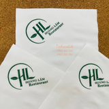 


																	 Khăn giấy ăn in logo Hoàng Lâm 