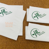 


																	 Khăn giấy ăn in logo Hoàng Lâm 