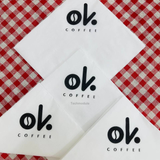 


																	 Khăn giấy ăn in logo OK COFFEE 