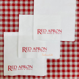 


																	 Khăn giấy ăn in logo RED APRON 