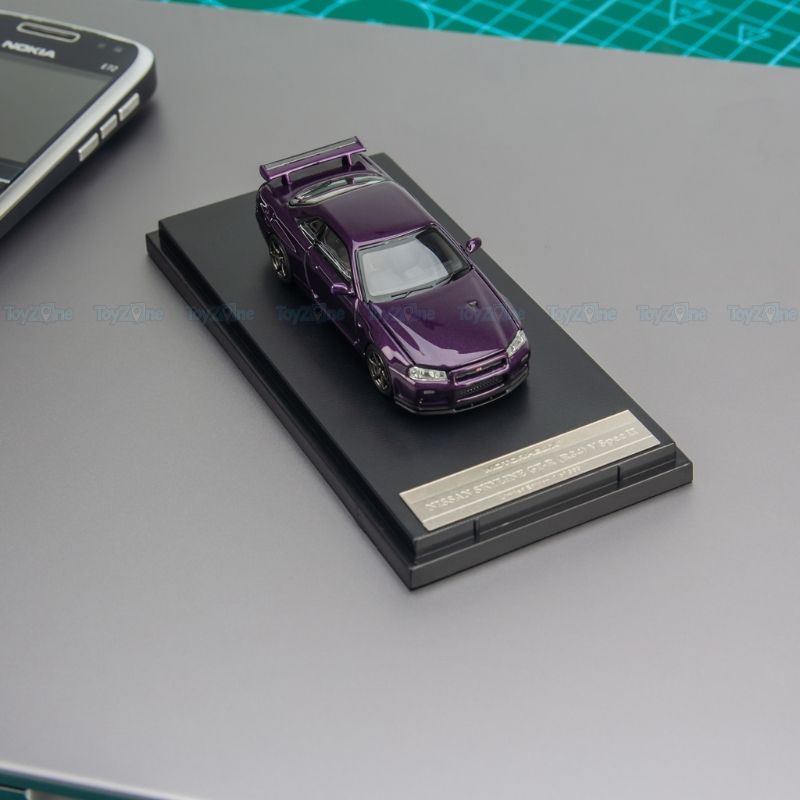  Mô hình xe Nissan Skyline GT-R R34 V-Spec II 1:64 MOTORHELIX 