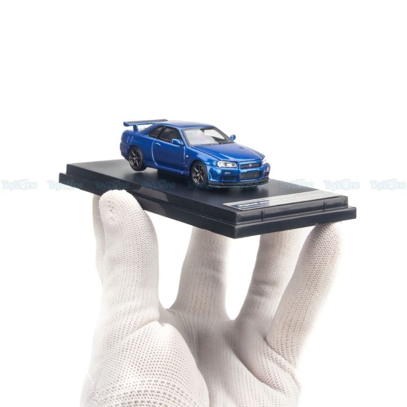  Mô hình xe Nissan Skyline GT-R R34 V-Spec II 1:64 MOTORHELIX 
