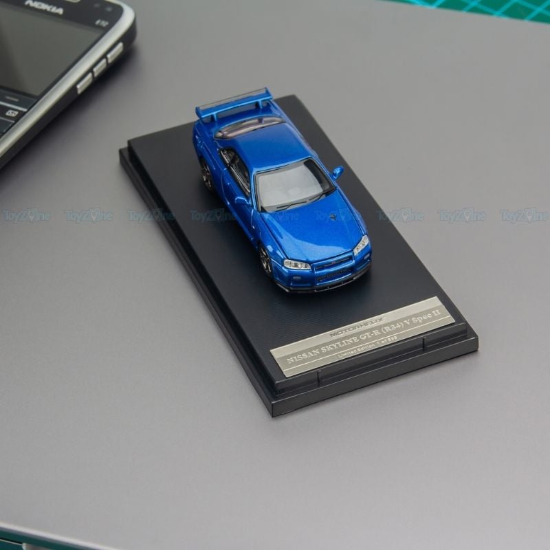  Mô hình xe Nissan Skyline GT-R R34 V-Spec II 1:64 MOTORHELIX 