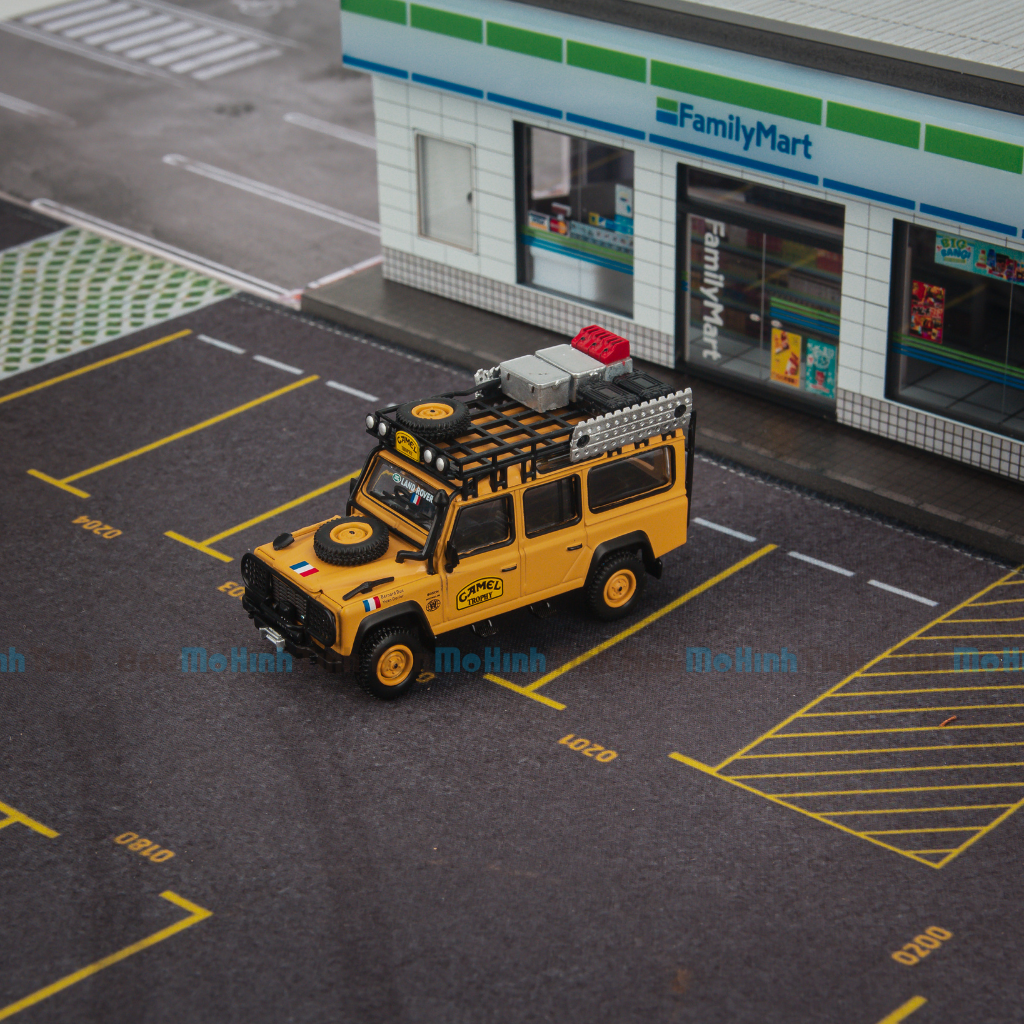 Mô hình xe Land Rover Defender 110 1989 Camel Trophy Amazon 1:64 MiniGT