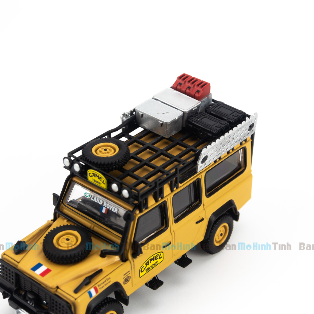 Mô hình xe Land Rover Defender 110 1989 Camel Trophy Amazon 1:64 MiniGT