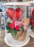  GẤU TEDDY ÔM HOA 