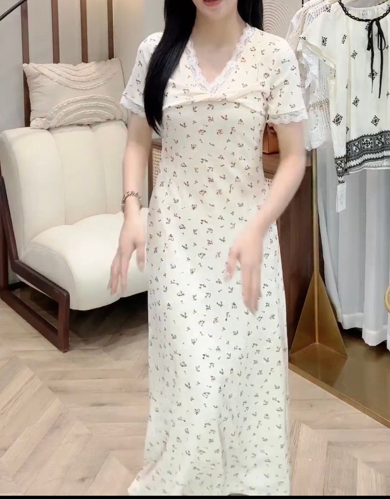 OAK0076 ĐẦM HOA NHÍ XOẮN NGỰC ( KEM )