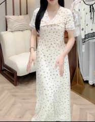 OAK0076 ĐẦM HOA NHÍ XOẮN NGỰC ( KEM )