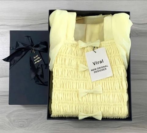 VRA0610 ĐẦM VÀNG MOCKING THUN TAY PHỒNG