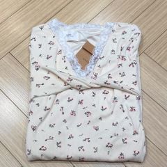 OAK0076 ĐẦM HOA NHÍ XOẮN NGỰC ( KEM )