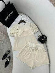 TB7064- Set QC áo đính nơ, quần short Kem