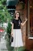 Áo croptop đen hoa thiên hương hồng SM699