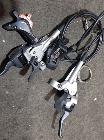 Tay bấm liền phanh dầu Shimano XT ST-M765