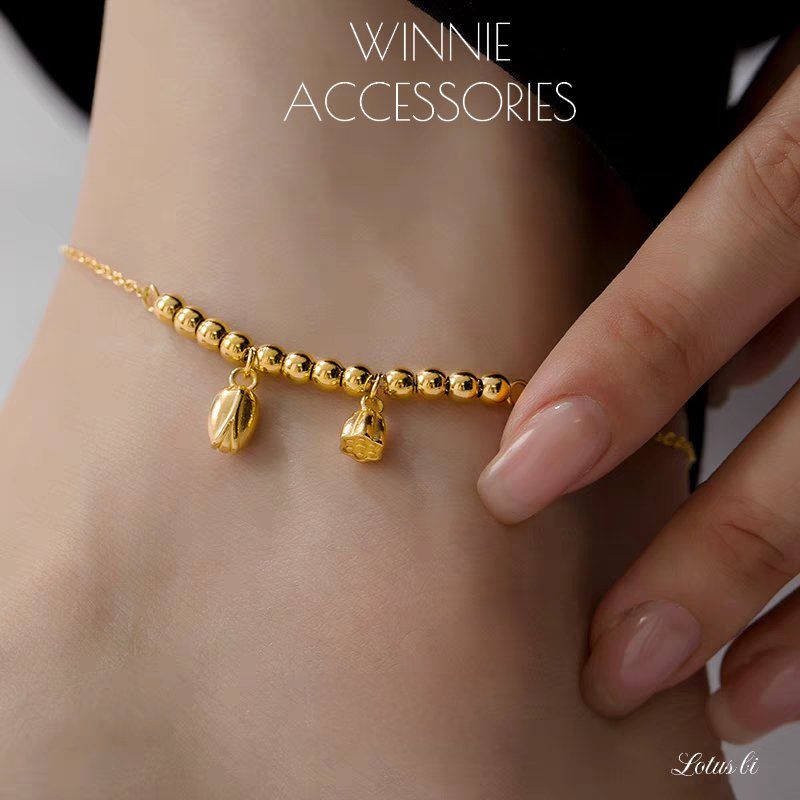  Lắc chân titan Lotus bi 