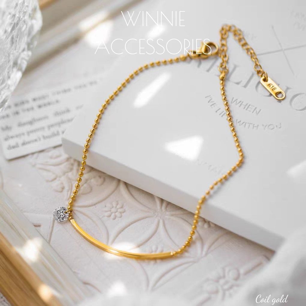  Lắc chân titan Coil gold 