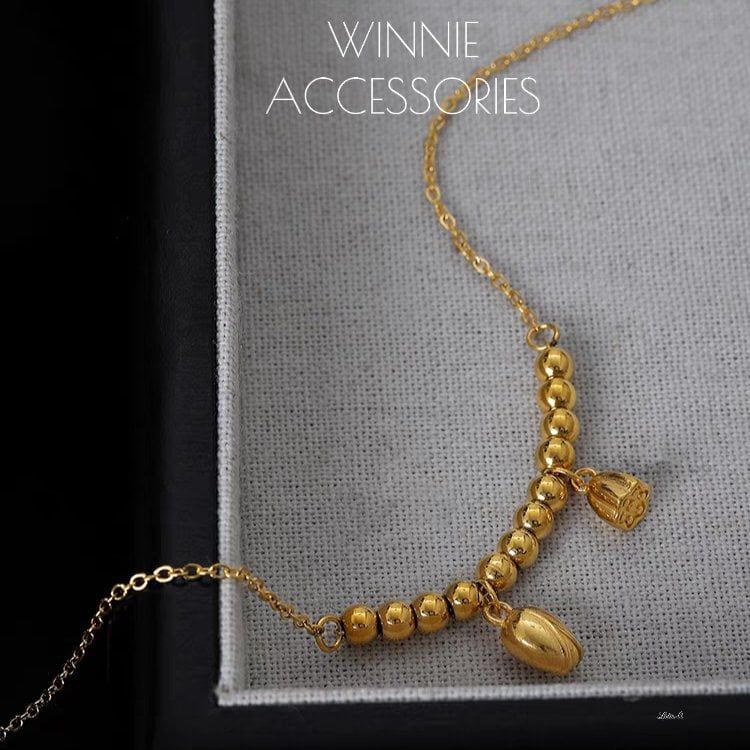  Lắc chân titan Lotus bi 