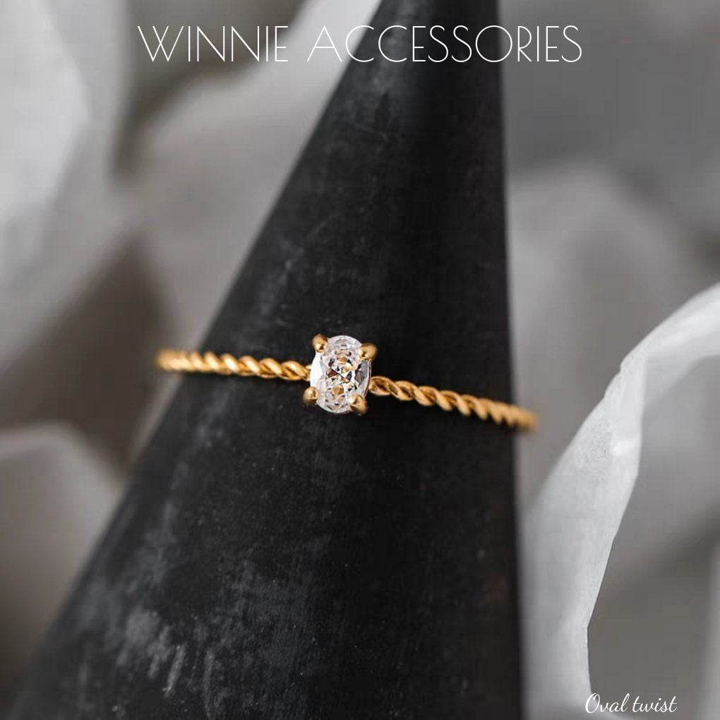  Nhẫn titan Oval twist 