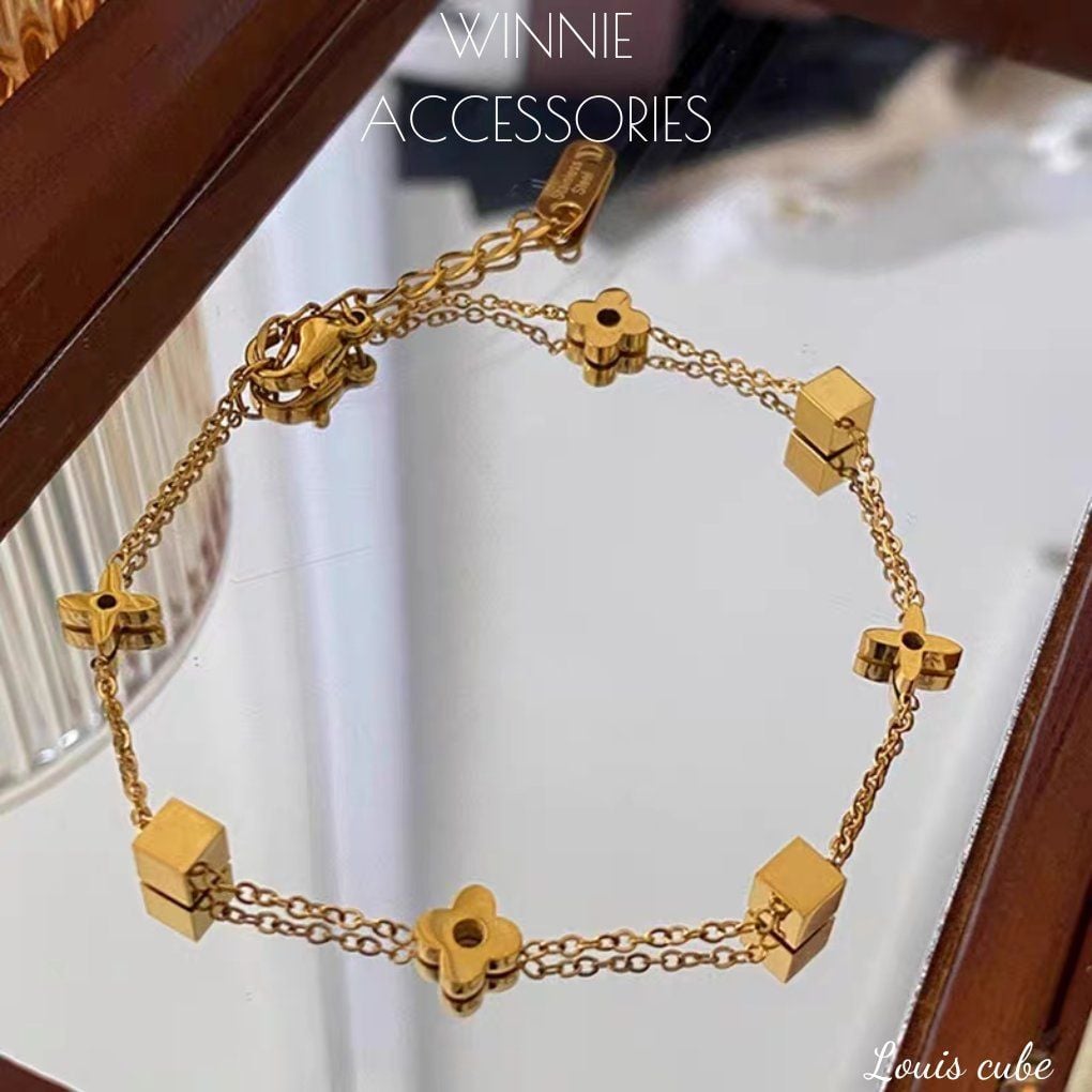  Lắc tay Titan Louis Cube 