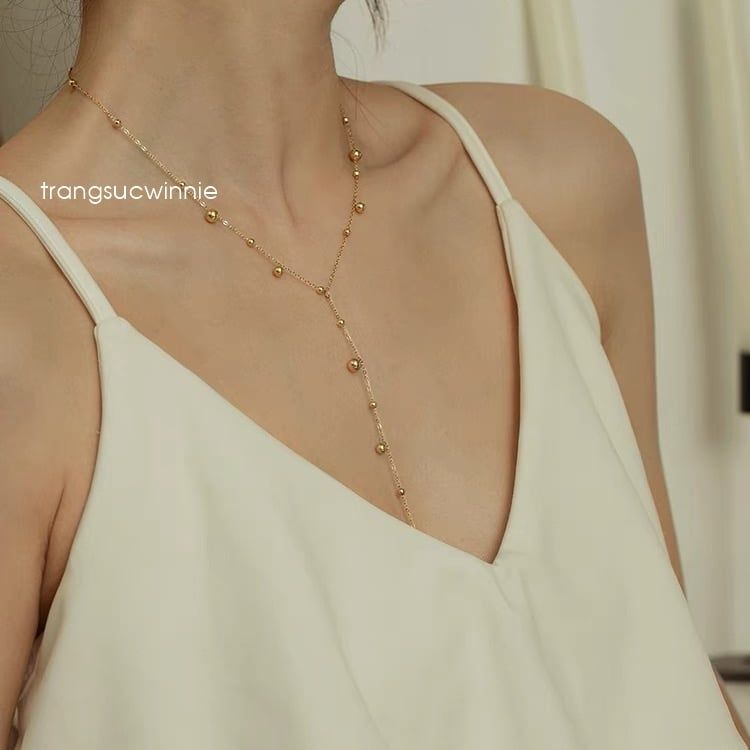  Dây chuyền titan Bi tua rua 