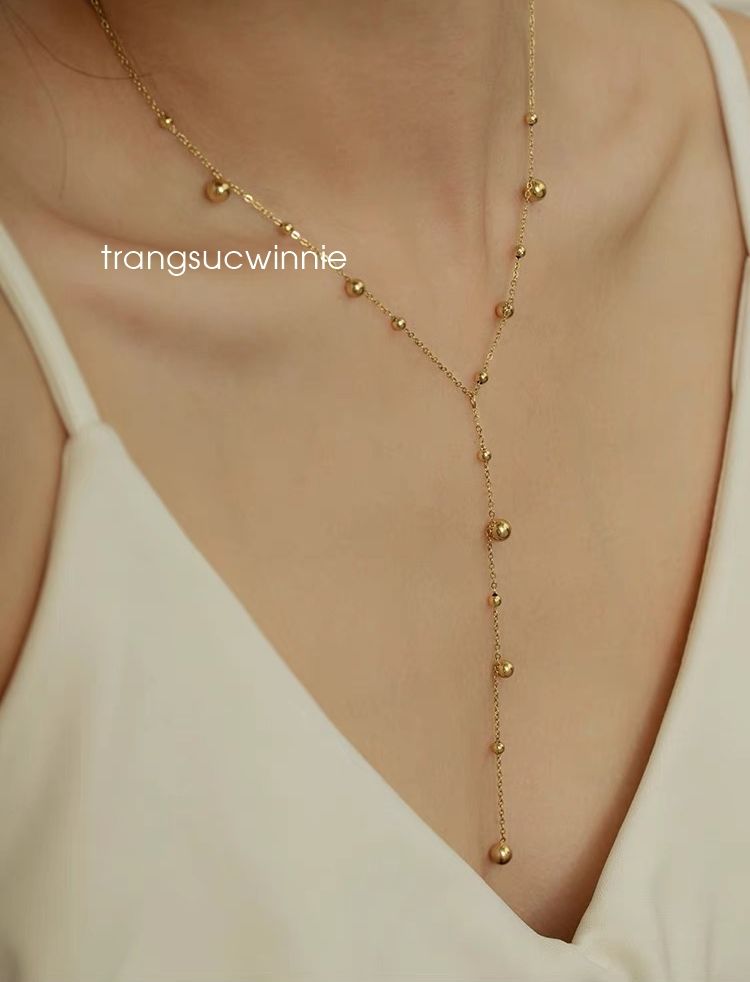 Dây chuyền titan Bi tua rua 