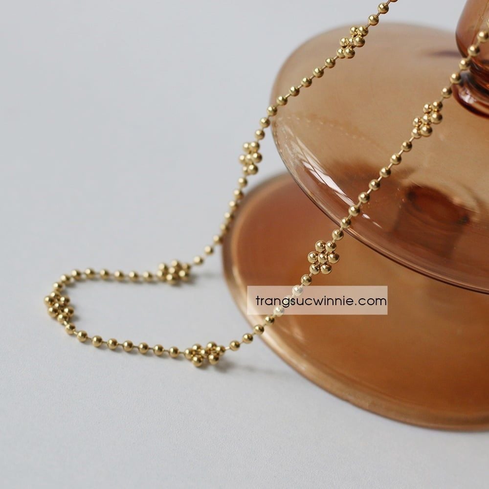  Dây chuyền titan Hoa bi 