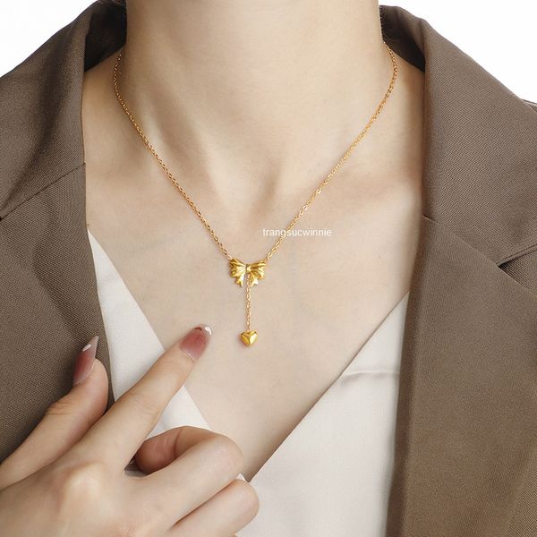  Dây chuyền titan Nơ tim dây 