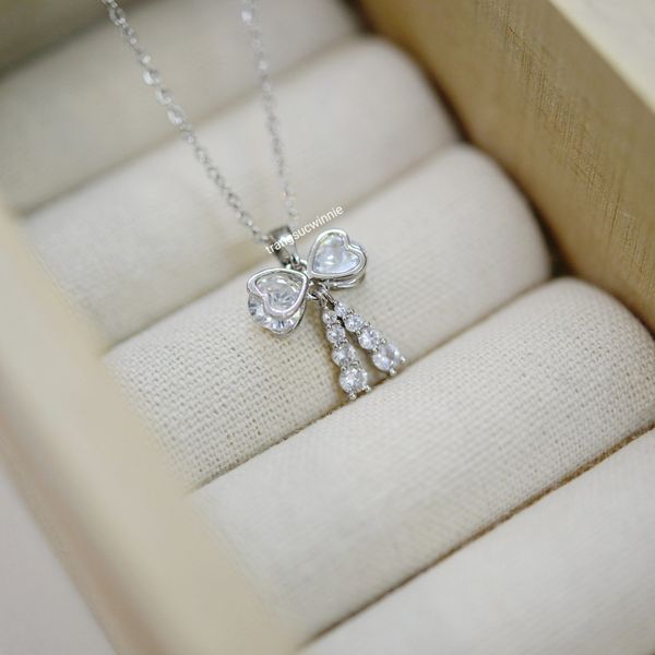  Dây chuyền titan Nơ Tòn ten 