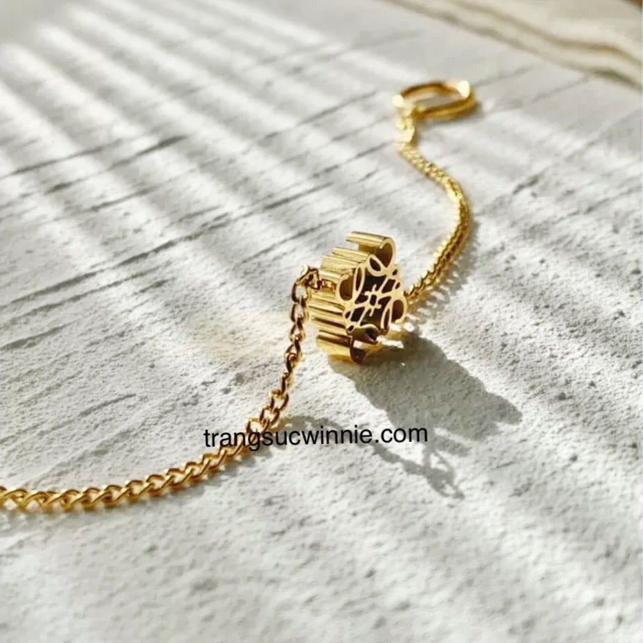  Lắc tay titan Hoa mỹ 