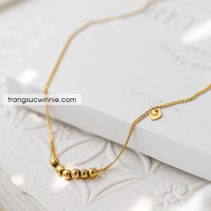  Lắc chân titan Bi Heart 
