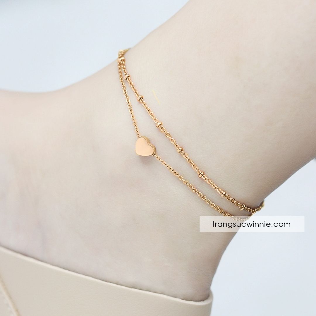  Lắc chân titan Tim 1 VG 