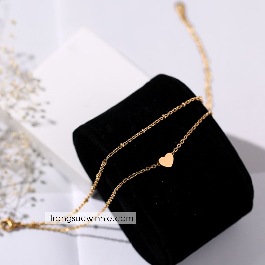  Lắc chân titan Tim 1 VG 