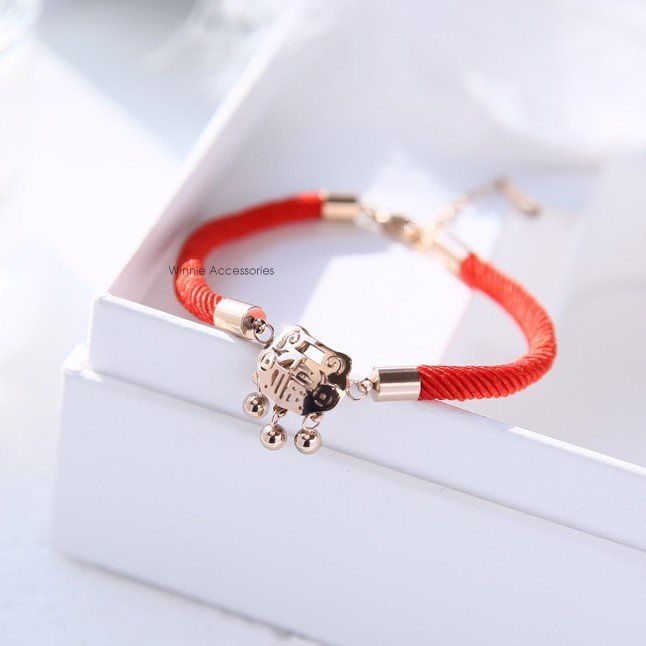  Lắc tay titan Khánh đỏ 