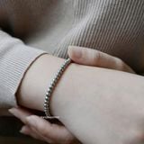  Lắc tay titan bi round tag 
