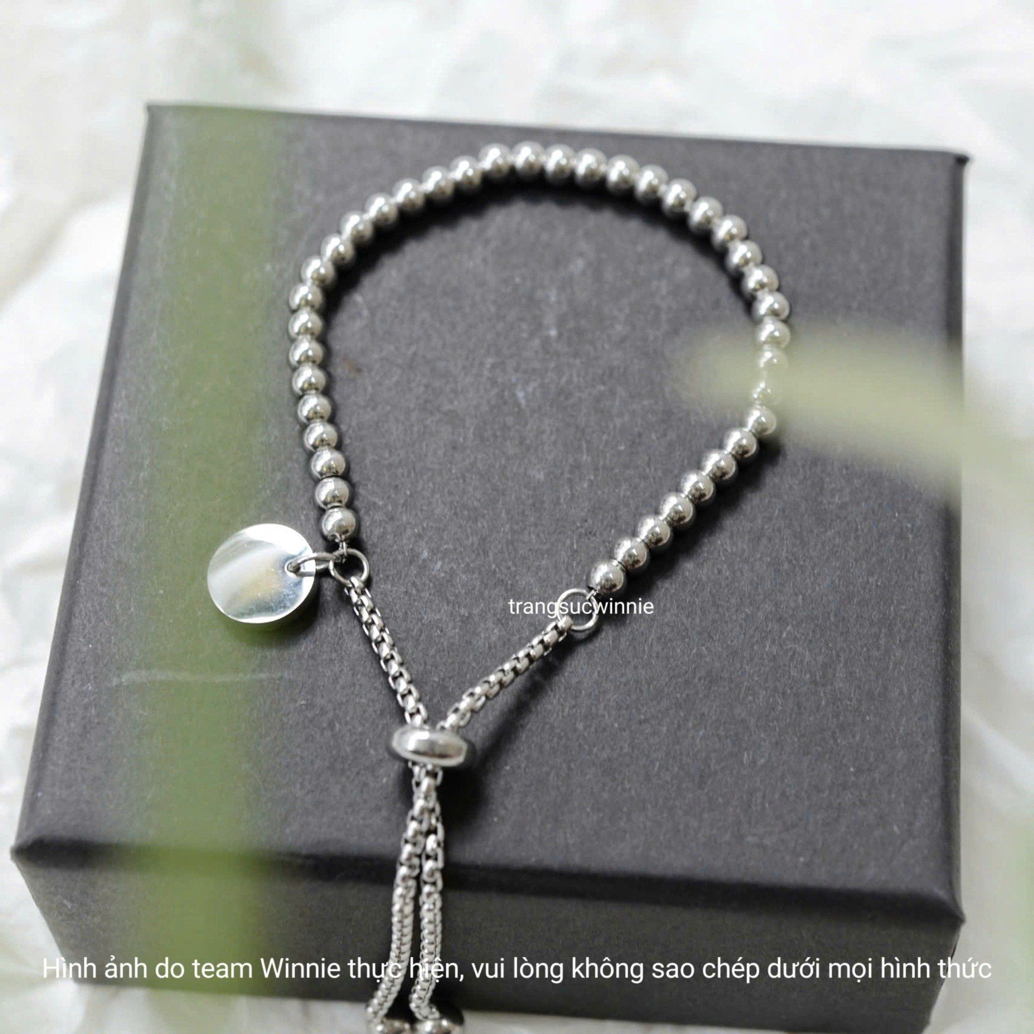  Lắc tay titan bi round tag 