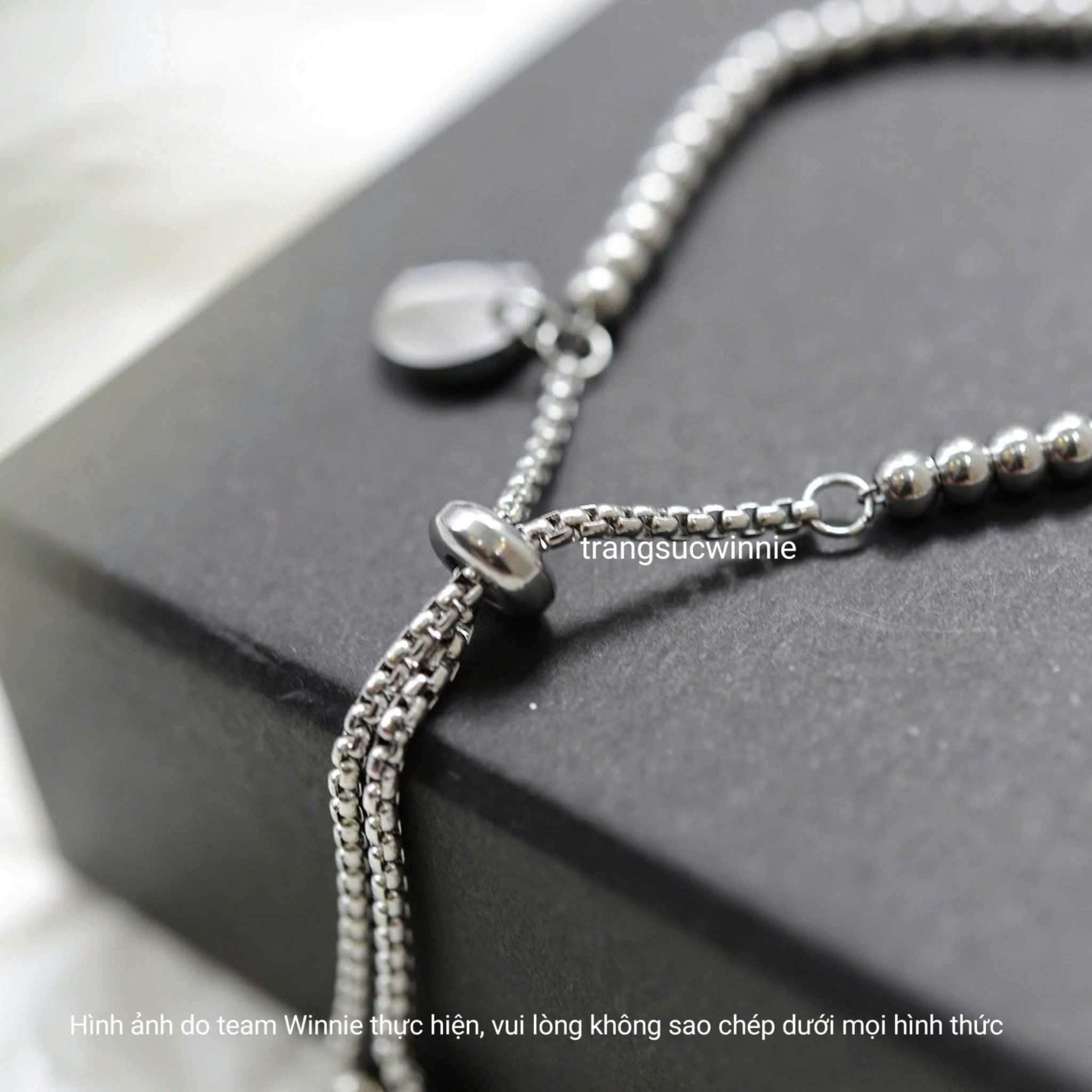  Lắc tay titan bi round tag 
