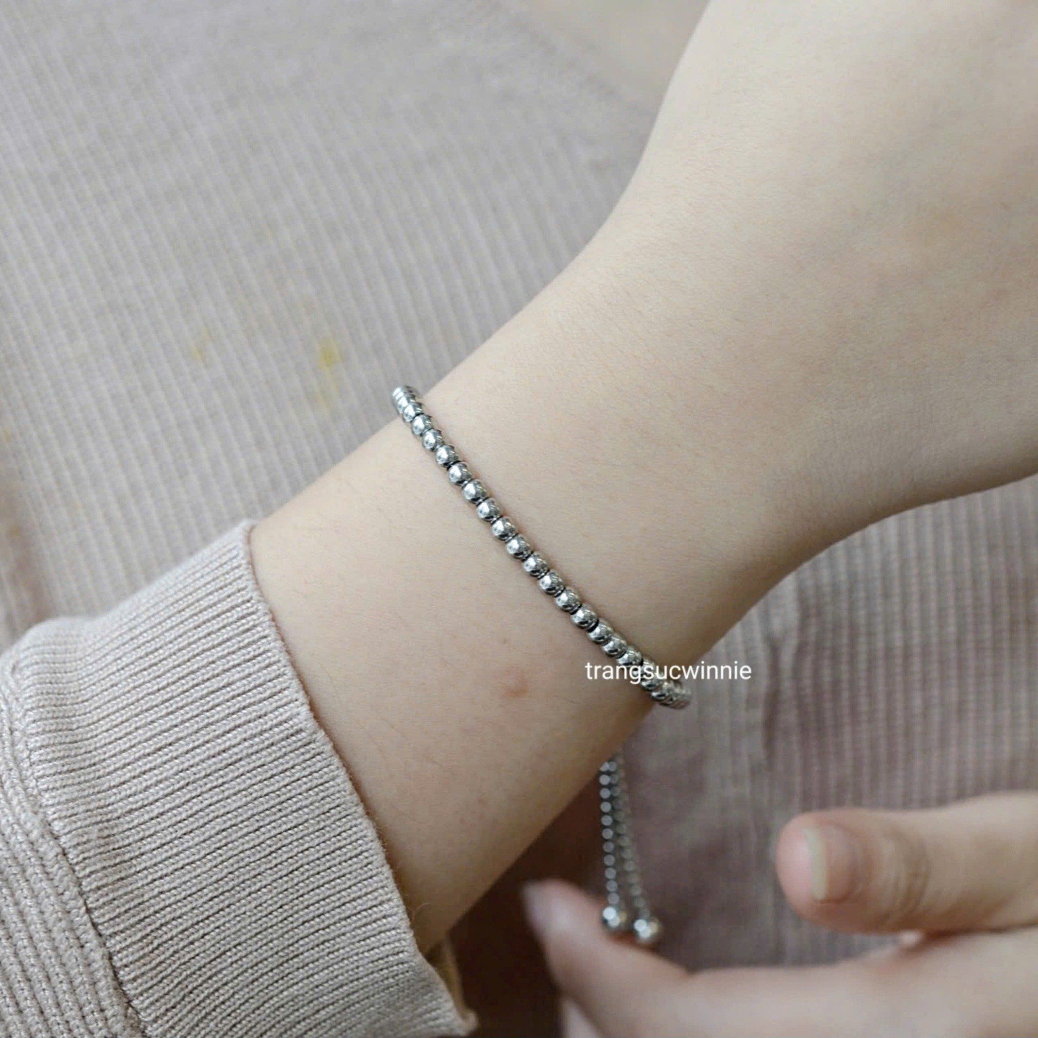  Lắc tay titan bi round tag 