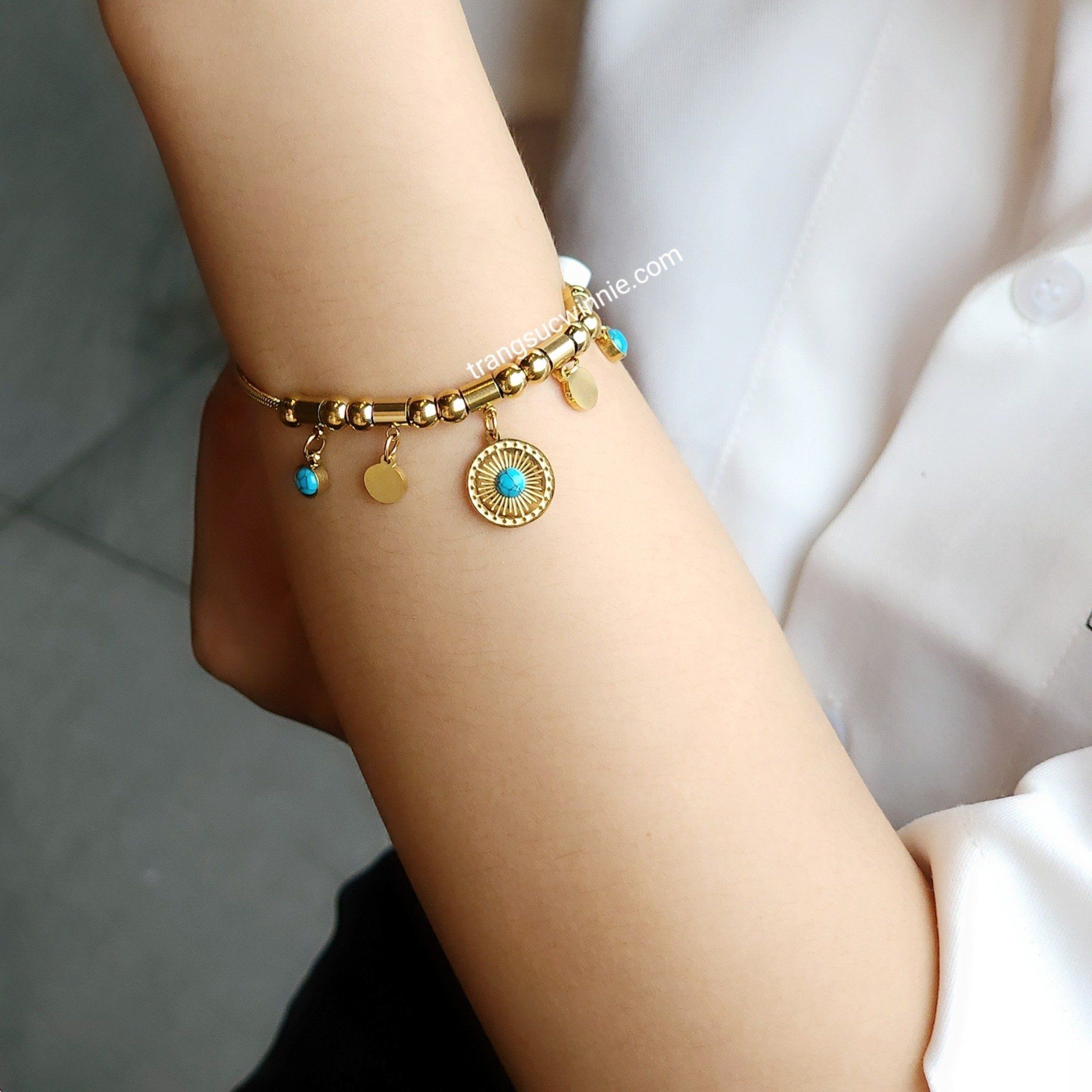  Lắc tay titan Charm xanh 