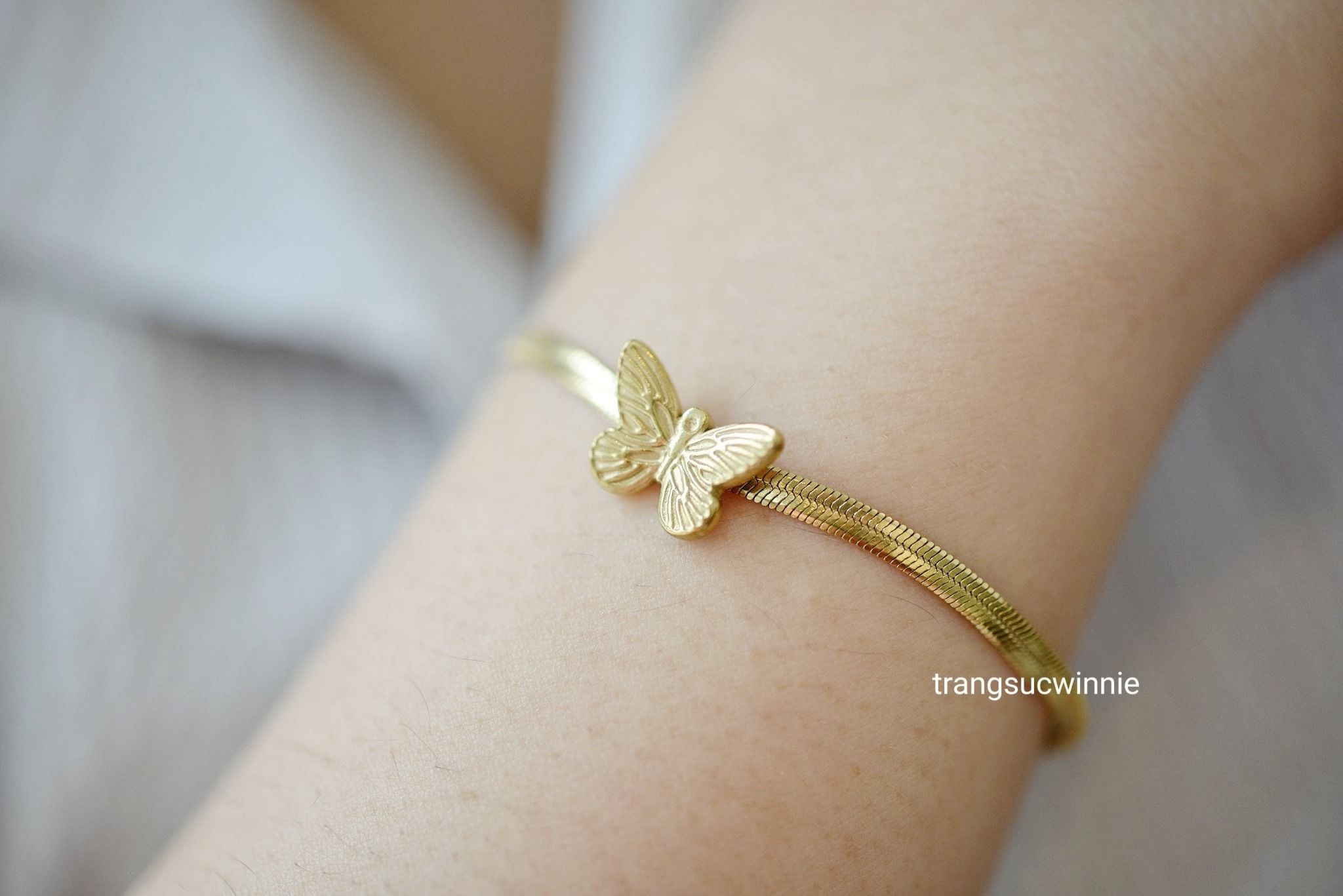  Lắc tay titan CK bướm 