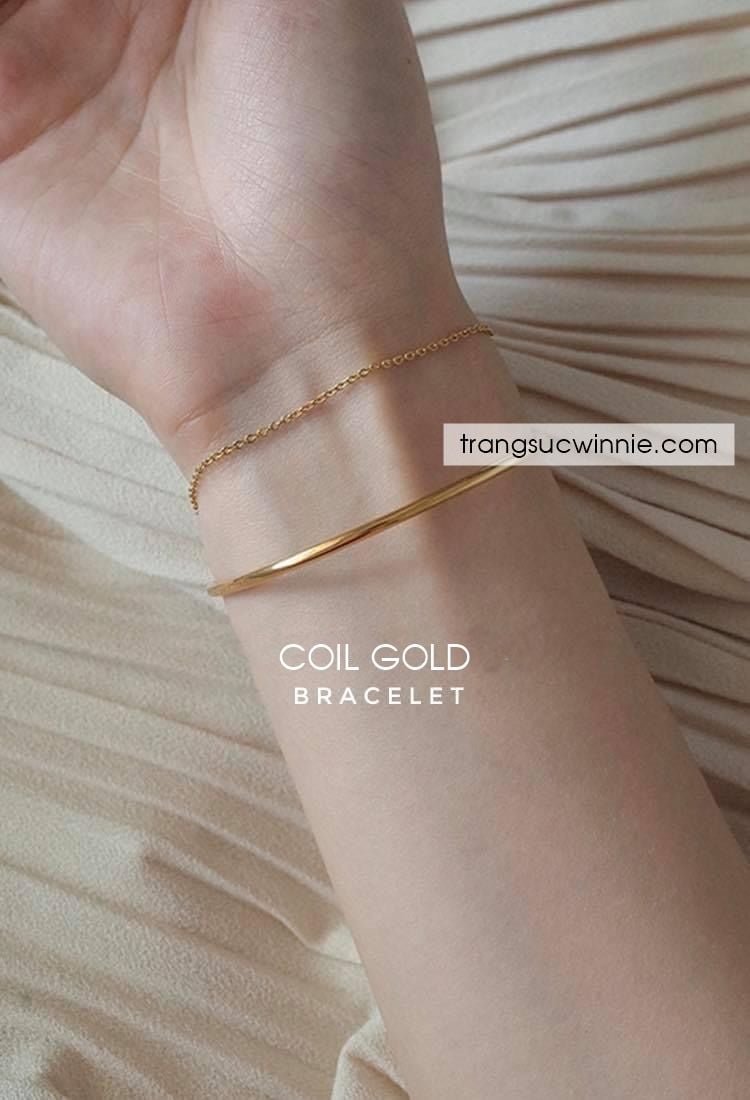  Lắc tay titan Coil gold 