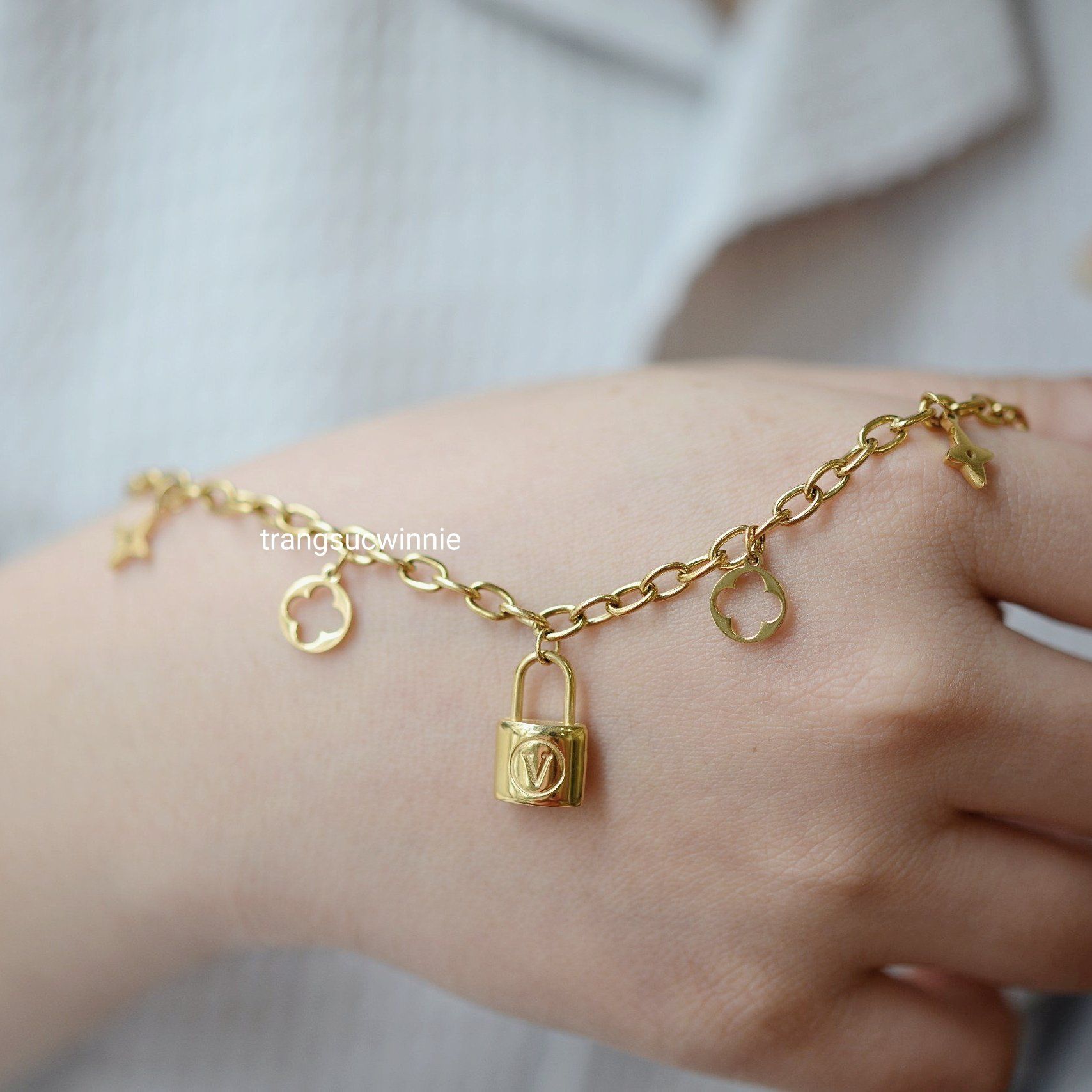  Lắc tay titan Louis key 