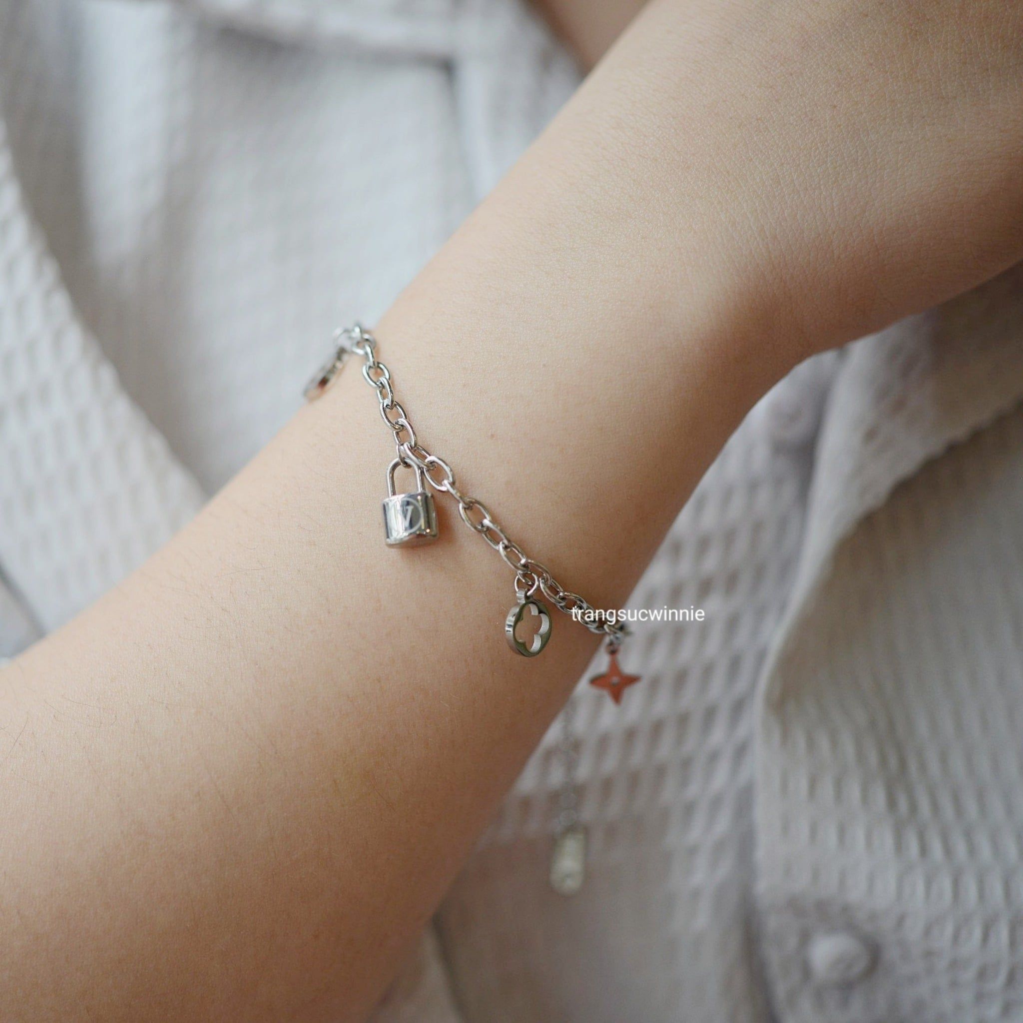  Lắc tay titan Louis key 