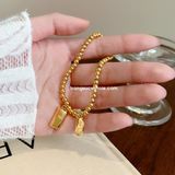  Lắc tay titan Thỏi vàng 