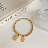  Lắc tay titan Thỏi vàng 