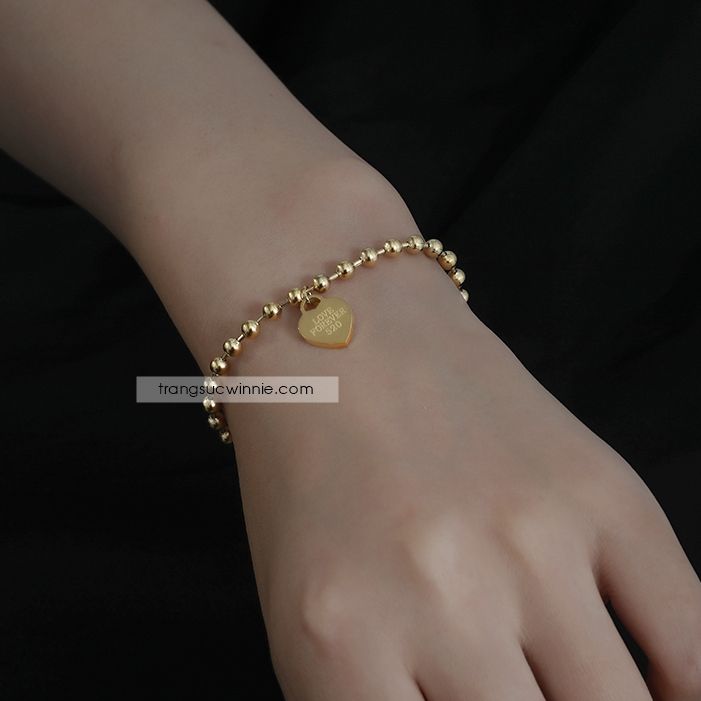  Lắc tay titan tim bi VG 