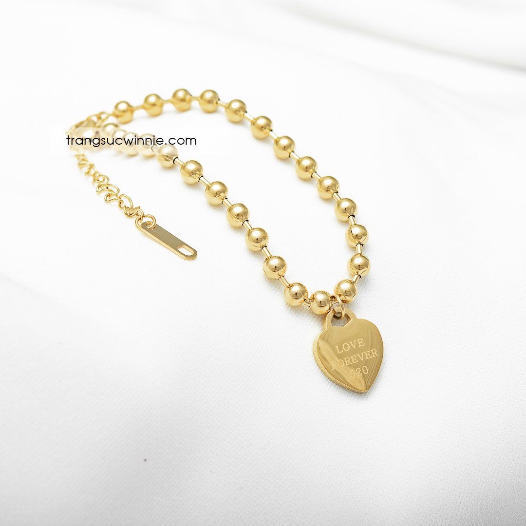  Lắc tay titan tim bi VG 